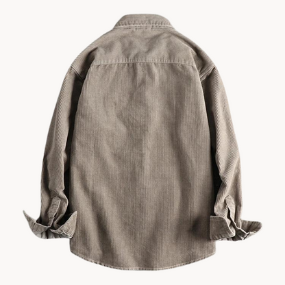 "Camicia uomo corduroy arancione con tasche sul petto, stile classico da lavoro, tessuto morbido e testurizzato."