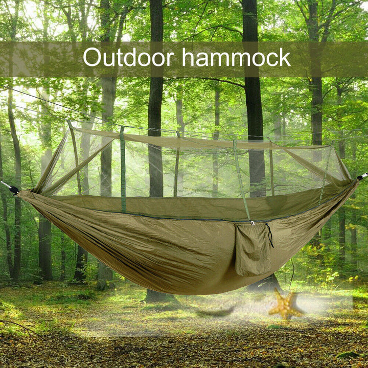 Compact camping hammock with robust net and waterproof rainfly, perfect for shelter.