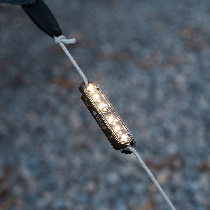 Portable LED camping rope light, USB-C rechargeable, ideal for outdoor adventures