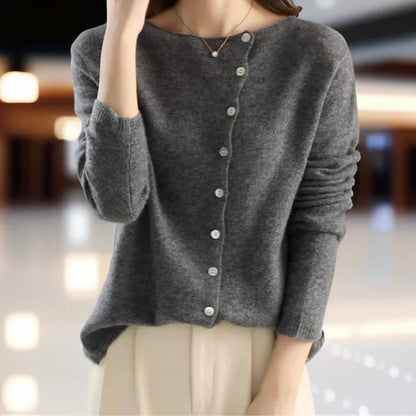 Cardigan in cashmere per donna, elegante e raffinato, con linee pulite e design versatile, perfetto per tutte le stagioni.