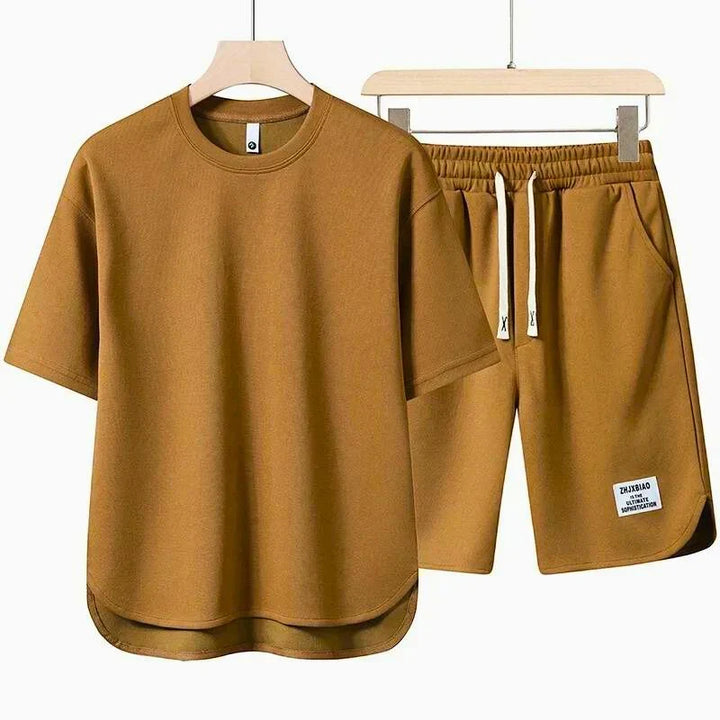 Relaxed comfort varsity shorts and t-shirt set. Stylish two-piece casual outfit for summer fashion.