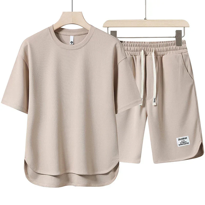 Varsity-inspired women's two-piece shorts set. Breathable t-shirt and shorts for casual summer wear.