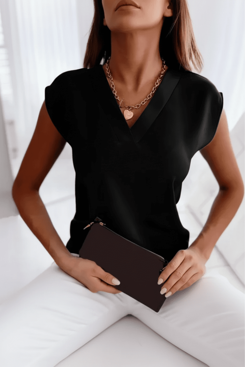Elegant women's going out top, featuring a chic open back. Versatile for evening events or everyday style.