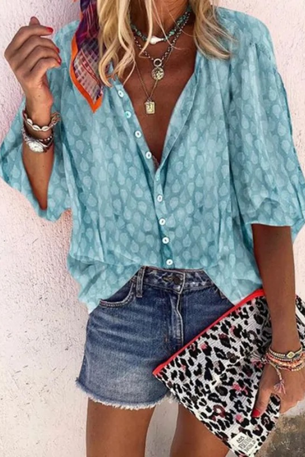 Chic women's airy button-down blouse, perfect for summer fashion & spring style. Comfortable & versatile relaxed fit top.