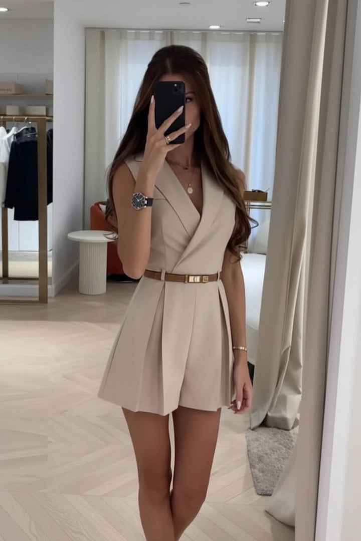 Stylish women's sleeveless belted romper, ideal comfortable casual wear for warm weather and vacation.
