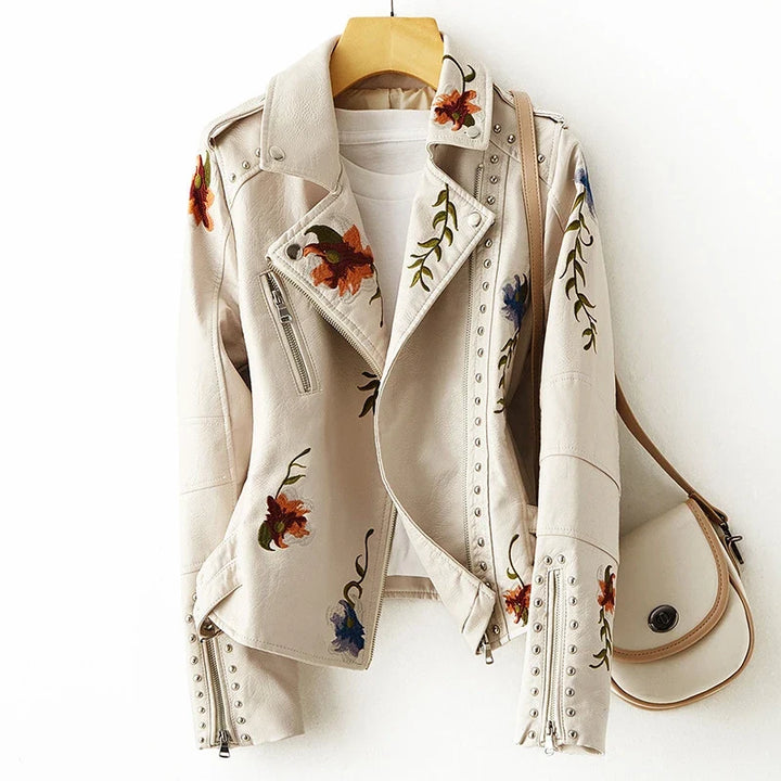 Chic women's beige moto jacket with edgy biker style. Modern outerwear for versatile fashion statements.