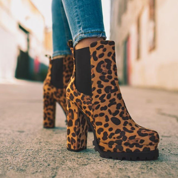 Stylish women's slip-on ankle boots with a platform & block heel, ideal casual or evening fashion footwear.