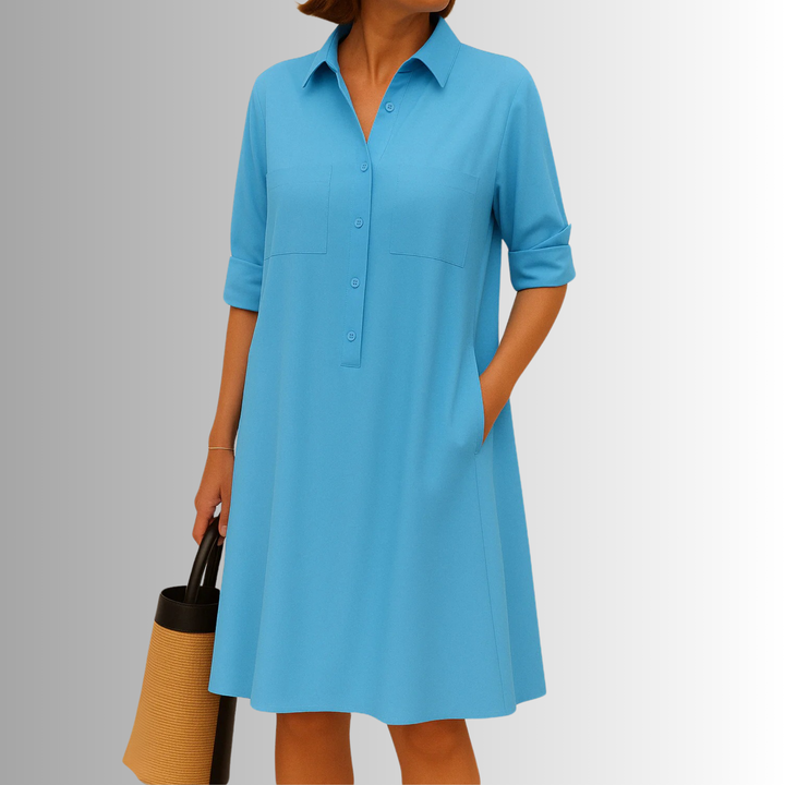 Versatile women's A-line dress in a vibrant pink. This button-front collared dress transitions from casual to elegant.