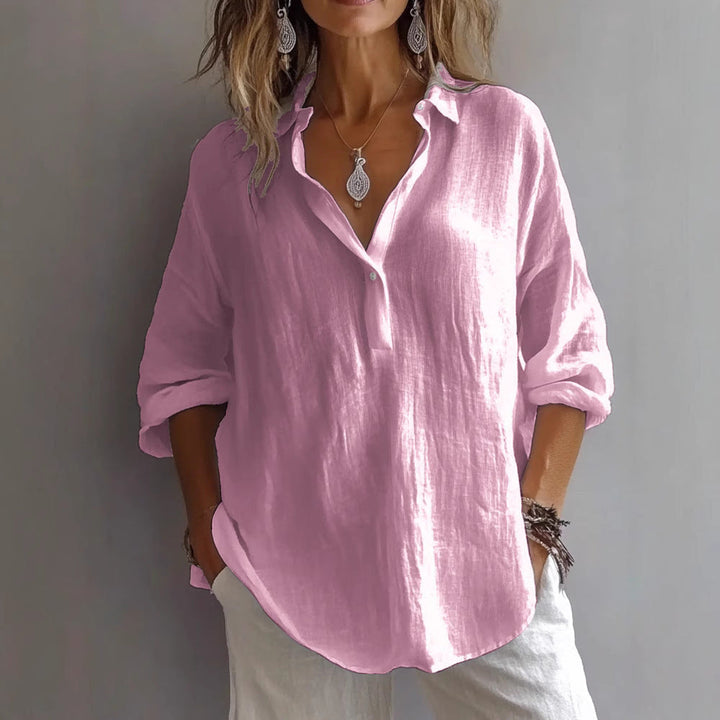 Everyday women's button-up shirt with flowing sleeves, relaxed fit, versatile & comfortable casual top.