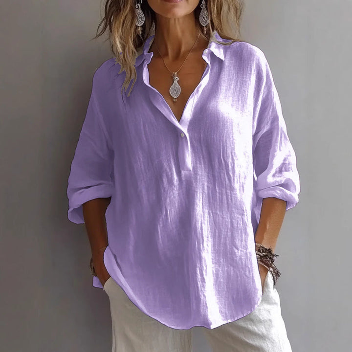 Versatile women's button-up shirt with flowing long sleeves, lightweight & breathable, great for daily wear.