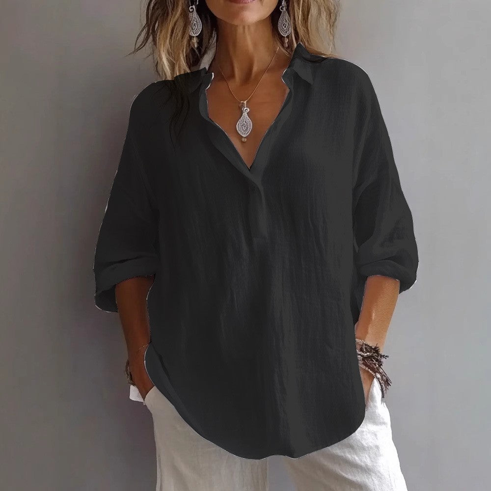 Casual women's button-up shirt, elegant flowing long sleeves, designed for breathable and comfortable wear.