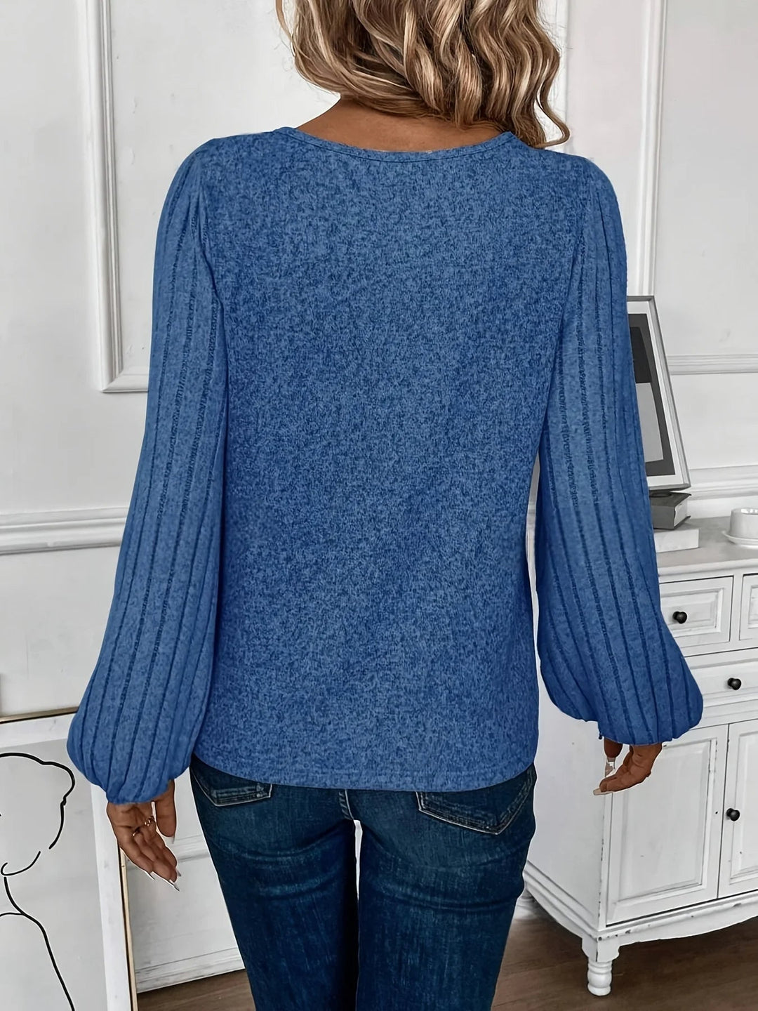 Women's V-neck knit sweater in Cascade style, featuring trendy balloon sleeves & a comfortable relaxed fit. Everyday wear.
