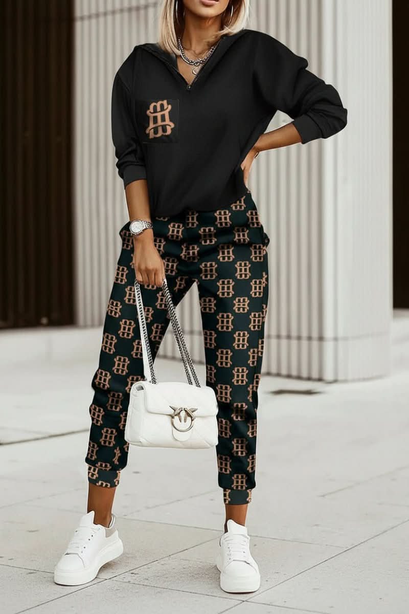 Chic women's casual tracksuit set for everyday comfort. Soft, stylish two-piece activewear, perfect for loungewear.