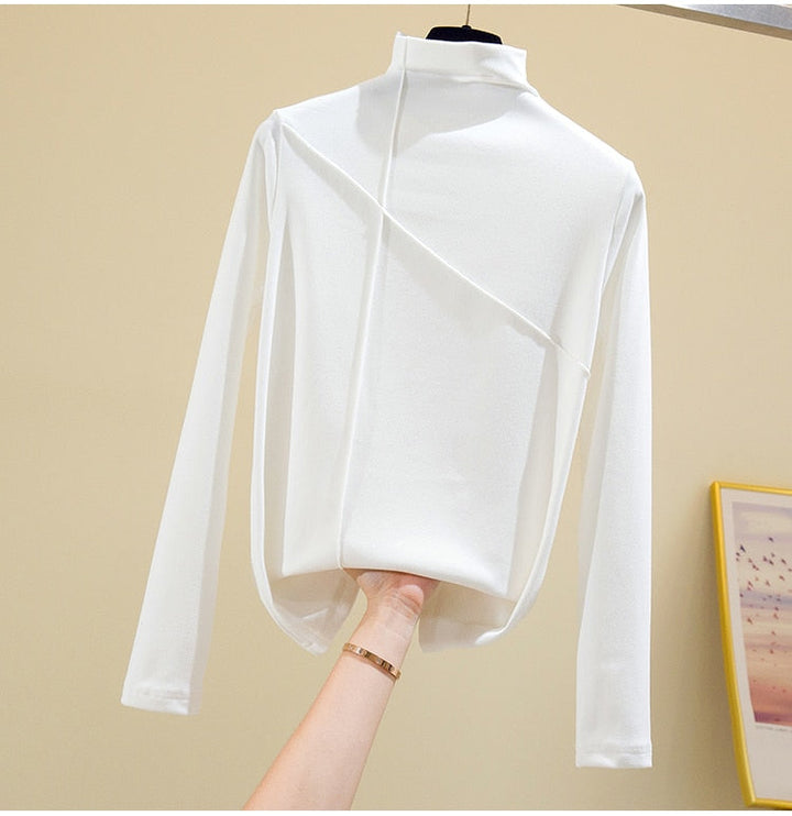 Stylish women's high-neck turtleneck top, a versatile long sleeve sweater for casual fall & winter outfits.