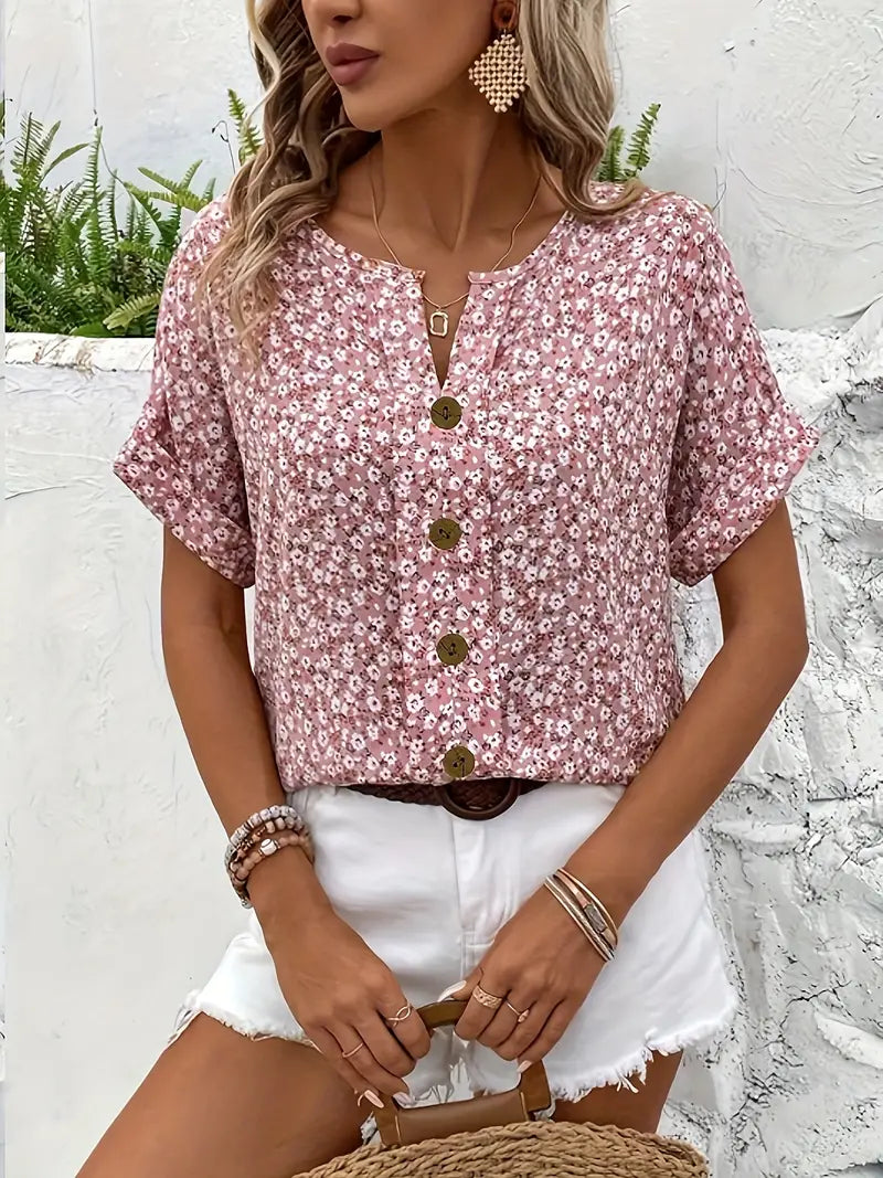 Close-up of the vibrant floral pattern on a chic women's printed blouse, perfect for spring & summer fashion.