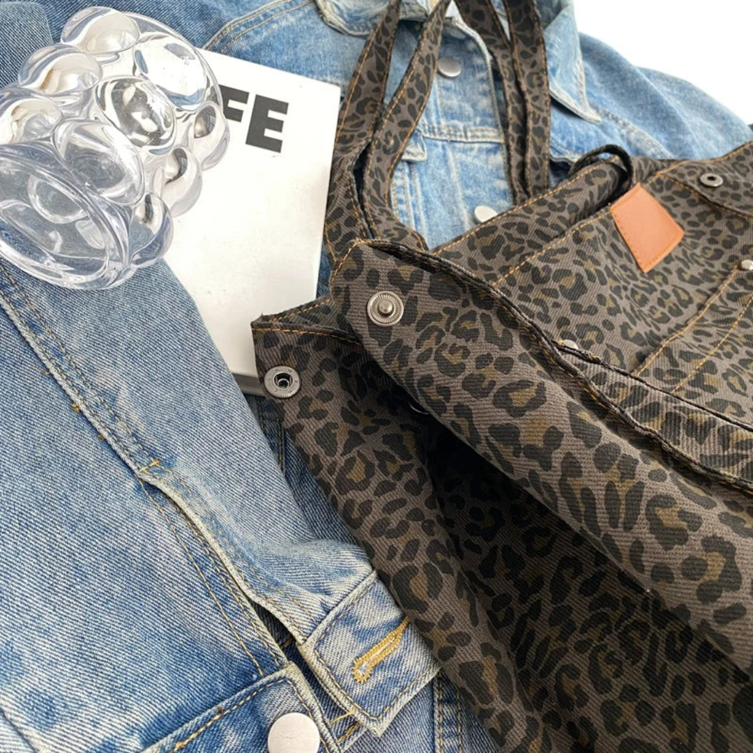 Versatile women's leopard print handbag, an elegant shoulder bag and fashion accessory.