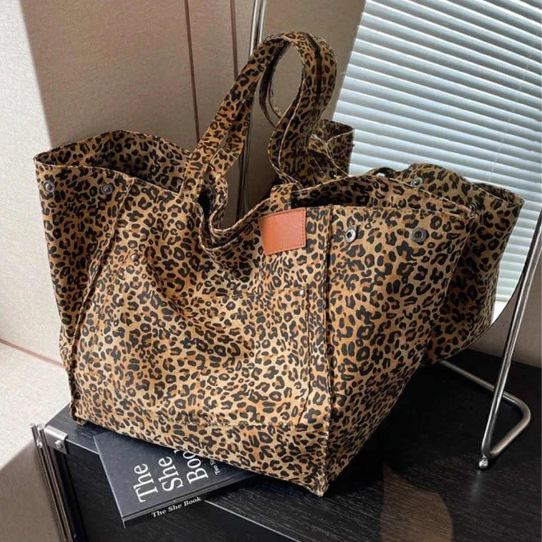 Stylish animal print tote bag for women, a chic leopard purse ideal for daily use.