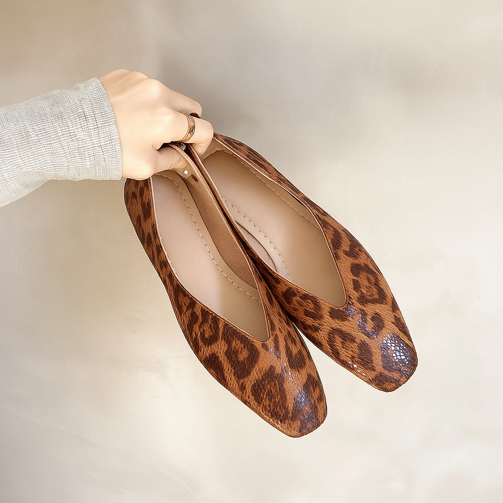 Women's Vale leopard print slip-on flats, offering chic style & comfort for any occasion.
