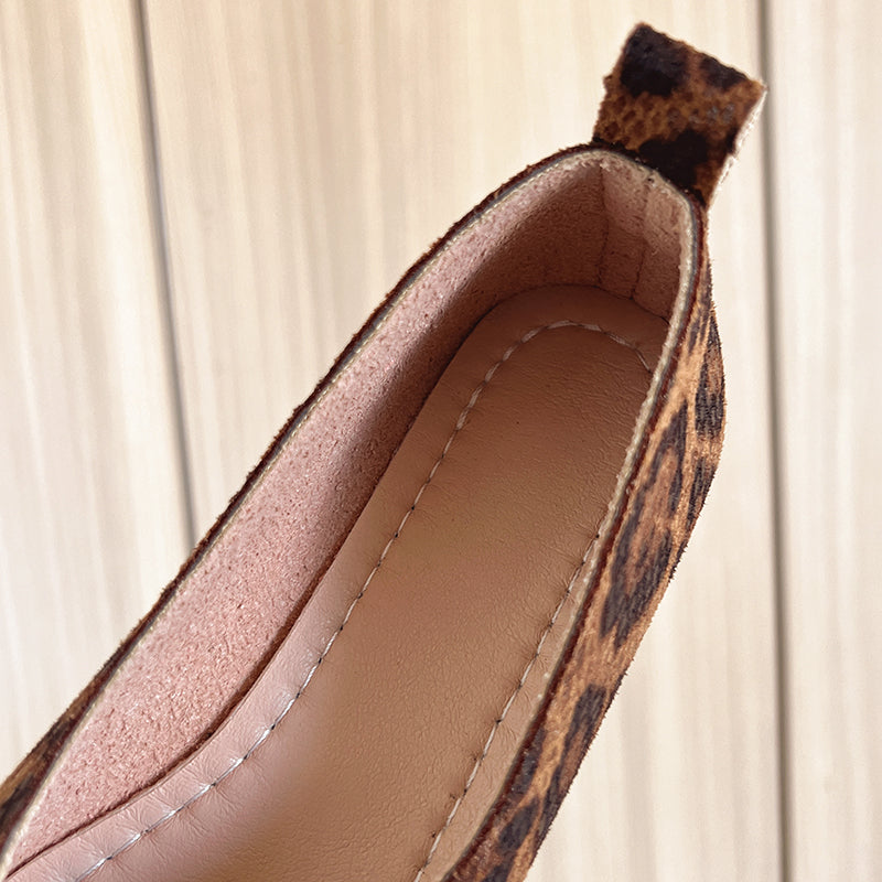Soft leopard print women's slip-on flats, blending comfort with chic, fashionable style.