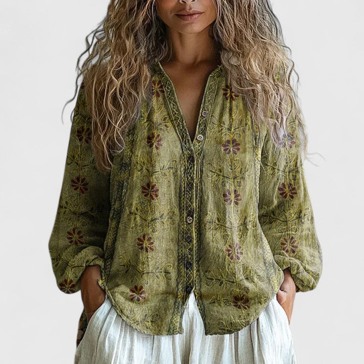 Elegant women's printed long sleeve blouse. Versatile top, perfect for any occasion from casual to professional.