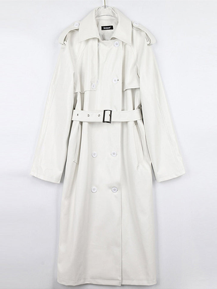 Women's chic long trench coat, crafted from quality fabric, a must-have for fall and spring fashion.