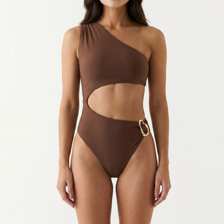 Stylish women's one-shoulder swimsuit featuring a trendy cut-out design, ideal for summer fashion & vacation.