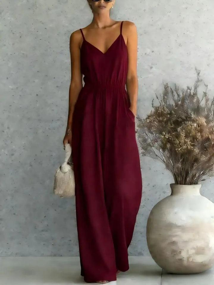 Women's V-neck wide leg casual jumpsuit, a stylish sleeveless one-piece. Ideal relaxed fit for summer outfits.