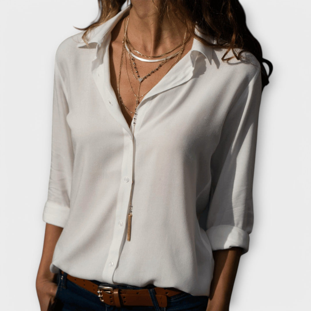 Chic women's versatile long-sleeve blouse for office or evening elegance. Stylish & comfortable top.