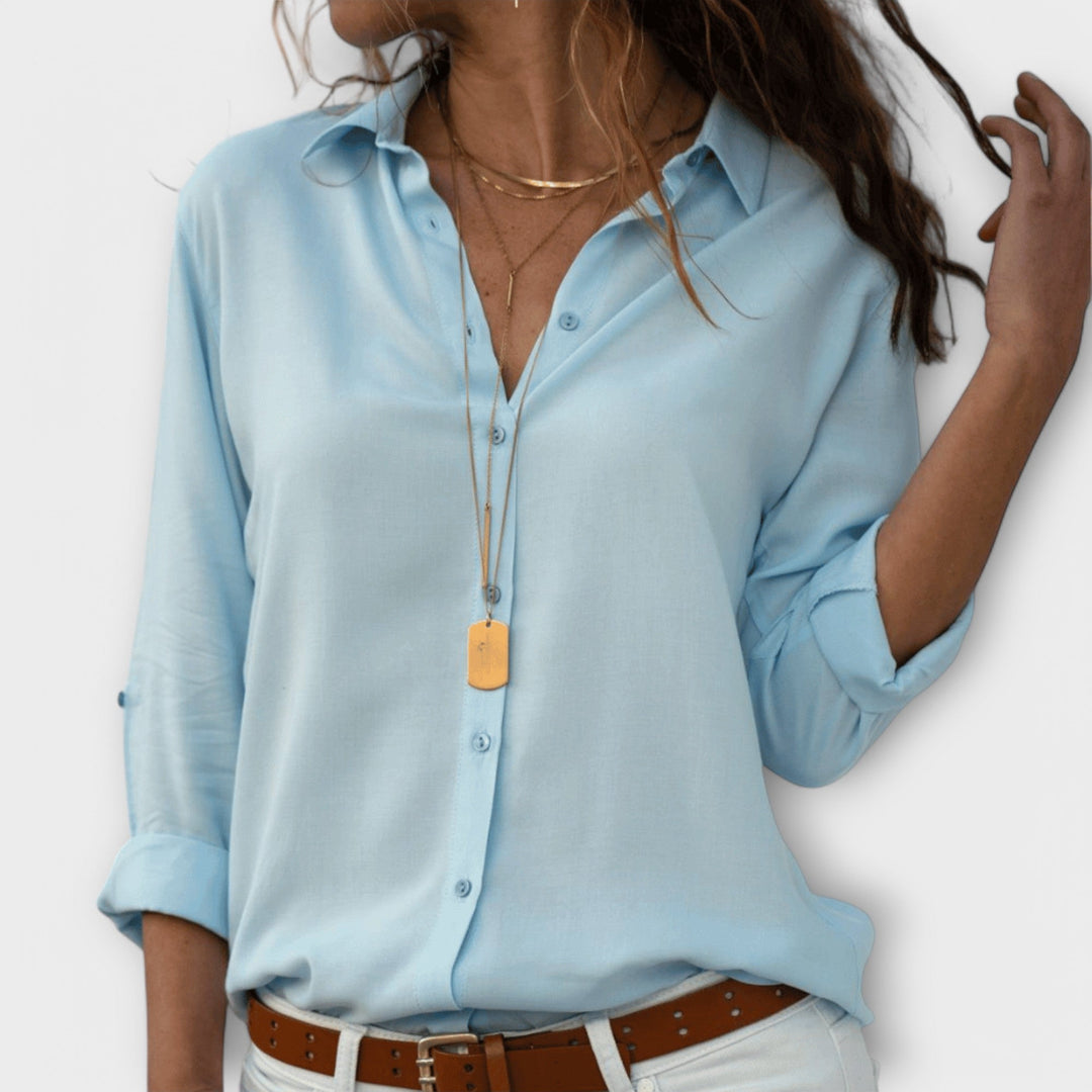Casual elegant women's long-sleeve top, comfortable and chic for everyday or office style.