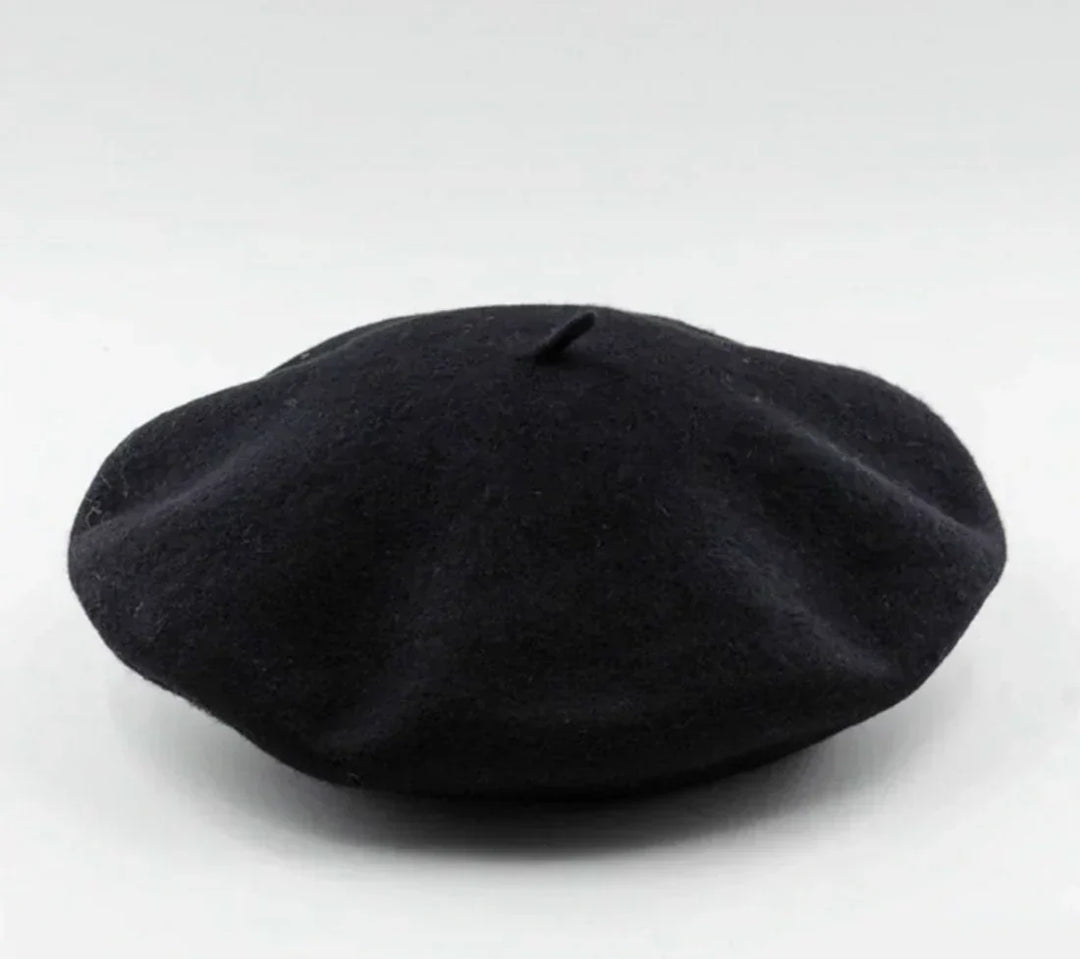Modern women's beret, a stylish winter hat accessory for a chic look, keeping you warm in cold weather.
