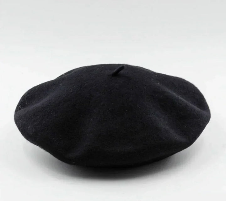 Modern women's beret, a stylish winter hat accessory for a chic look, keeping you warm in cold weather.