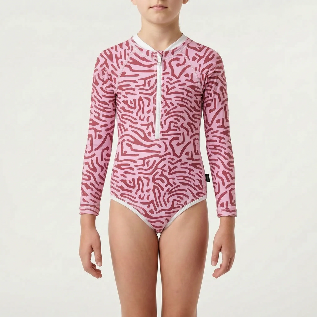One-piece long-sleeve toddler swimsuit for comprehensive sun protection during outdoor play.