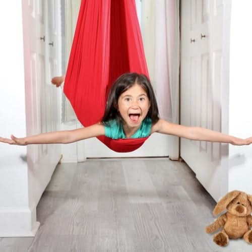 Sensory play swing for kids, offering calming therapy, focus improvement & indoor fun.