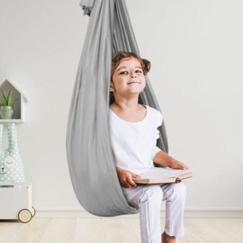 Durable children's therapy swing for sensory input, promoting calm & focus in kids.