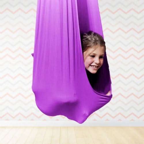 Calming indoor swing for children's sensory therapy, promoting focus & relaxation.