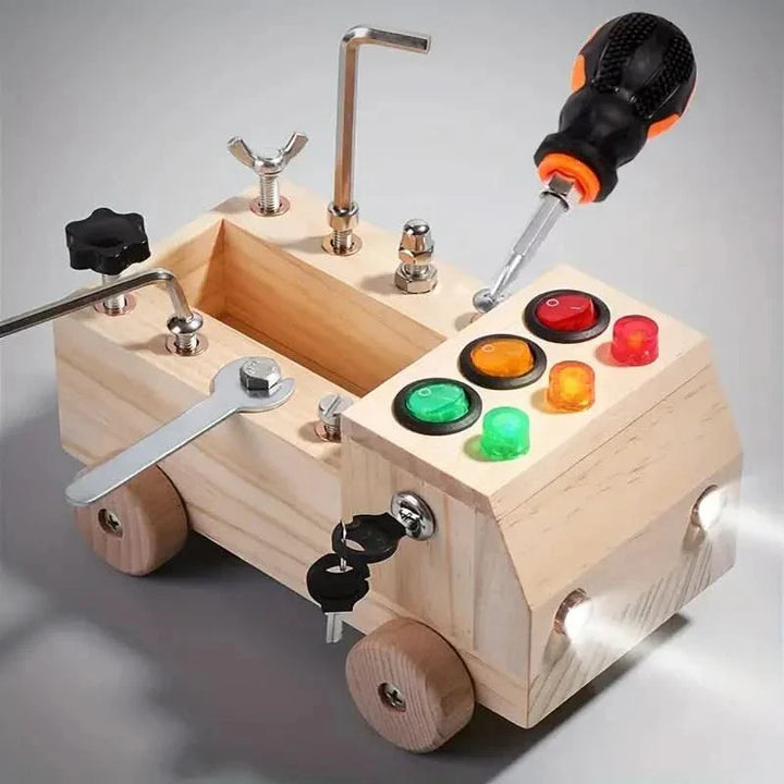 Toddler busy board, a wooden educational toy for sensory play and developing fine motor skills in young children.