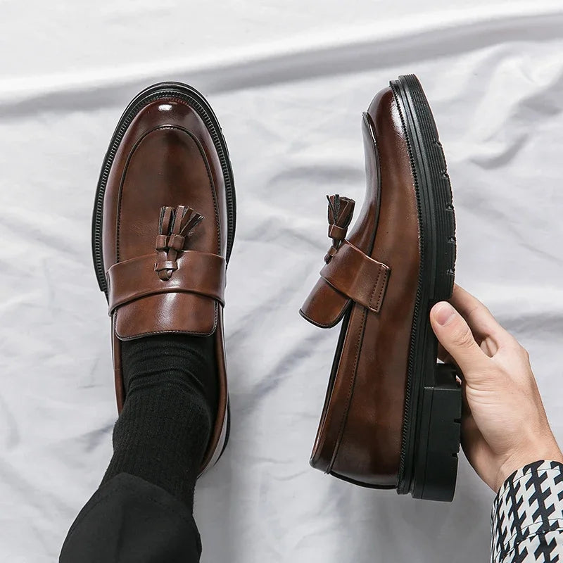 Fashionable men's loafers, elegant & comfortable slip-on dress shoes for a distinguished look.