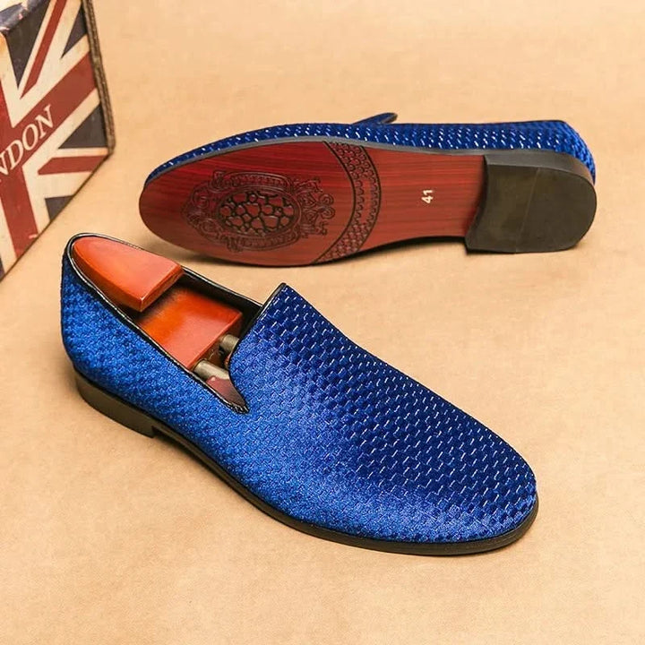 Elegant white men's slip-on loafers, ideal for casual & formal occasions.