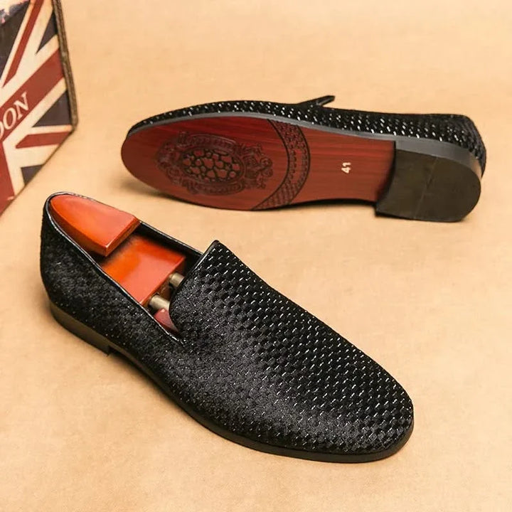 Men's classic black slip-on loafers, comfortable & stylish everyday footwear.