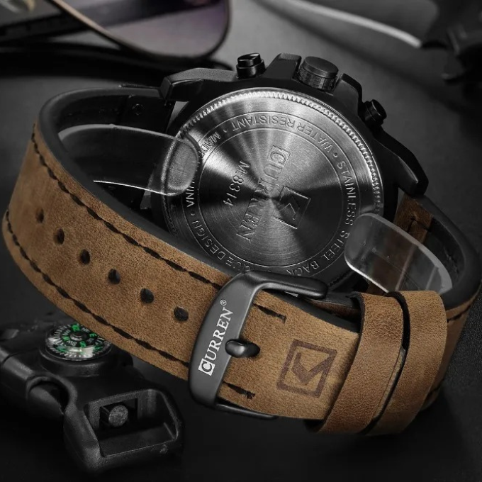 Back view: Men's chronograph watch, engraved stainless steel case, showing water-resistant rating.