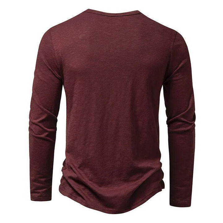 Stylish menswear: slim fit long sleeve henley shirt, ideal for a refined casual look.