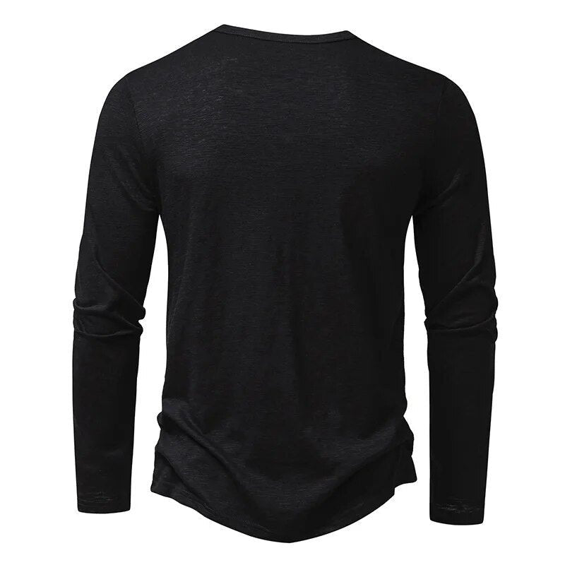 Modern men's long sleeve henley top, slim fit cut, perfect for casual or smart-casual wear.