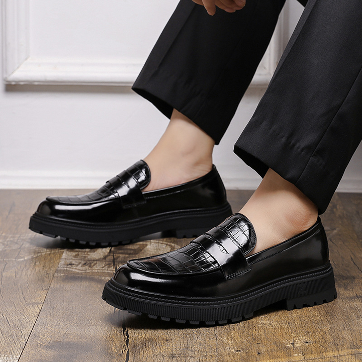 Comfortable men's slip-on loafers, offering polished style for versatile everyday and casual outfits.