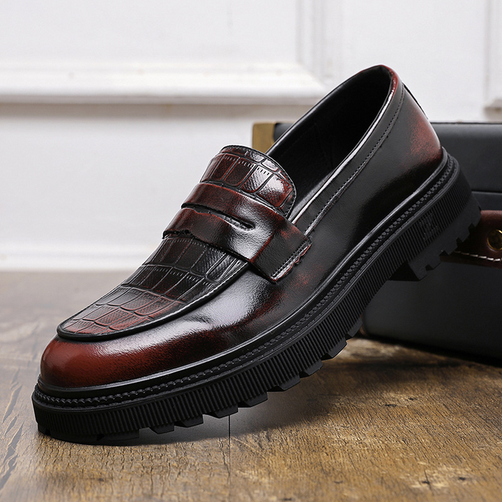 Polished finish men's slip-on loafers, classic everyday footwear for a smart and comfortable style.