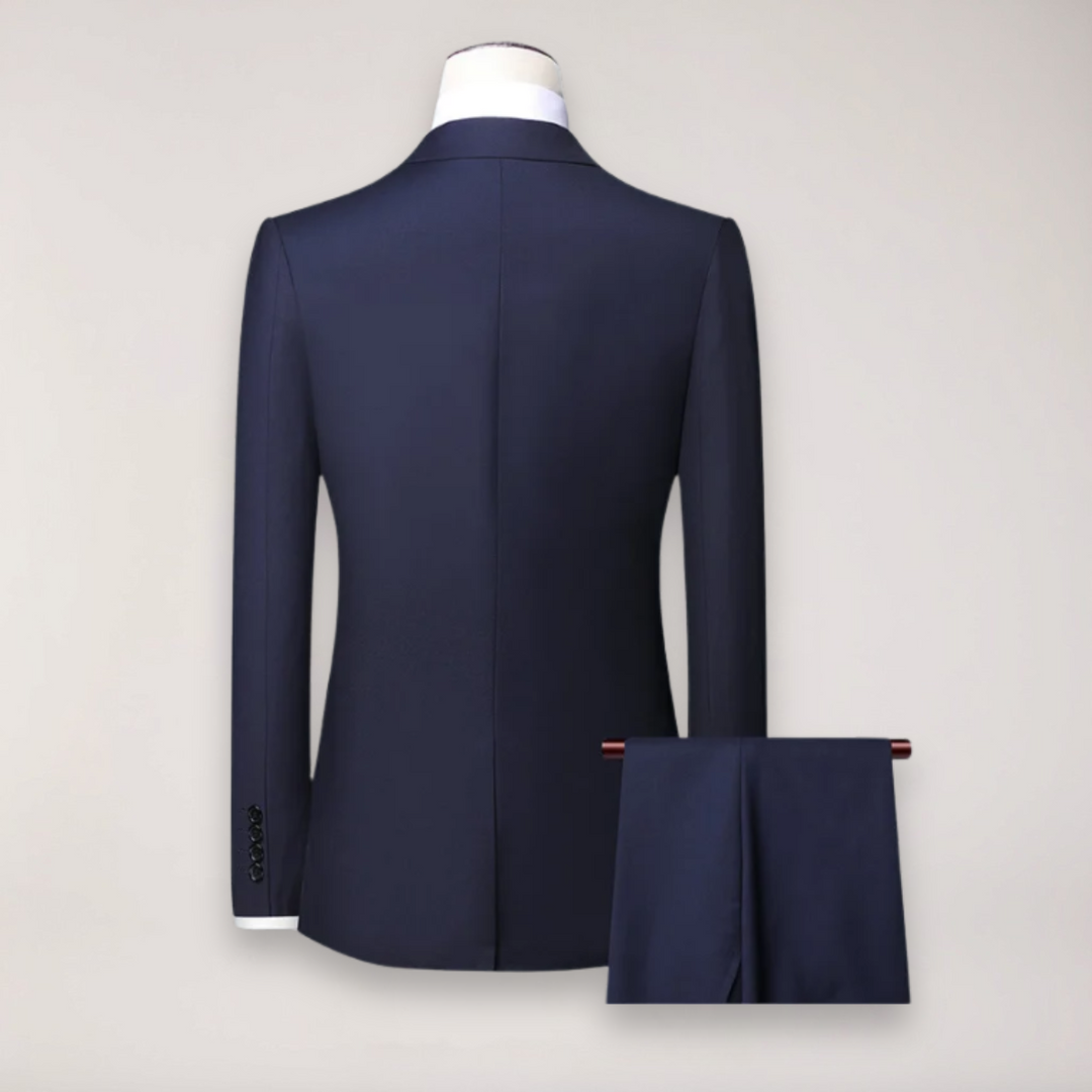 Sophisticated men's three-piece suit featuring a blazer, waistcoat & trousers for weddings & business events.