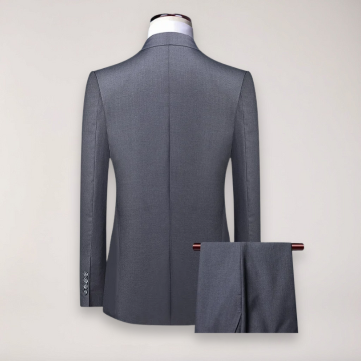 High-quality men's formal wear: a three-piece tailored suit including blazer, waistcoat & trousers.
