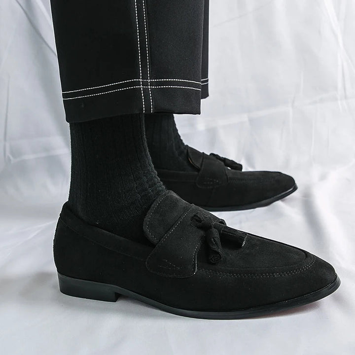 Classic men's tassel loafers, essential elegant slip-on dress shoes for polished business casual looks.