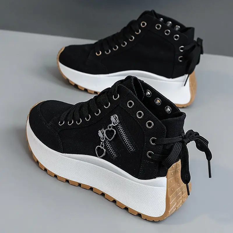 Stylish blue denim lace-up footwear, designed for everyday comfort and versatile unisex fashion.