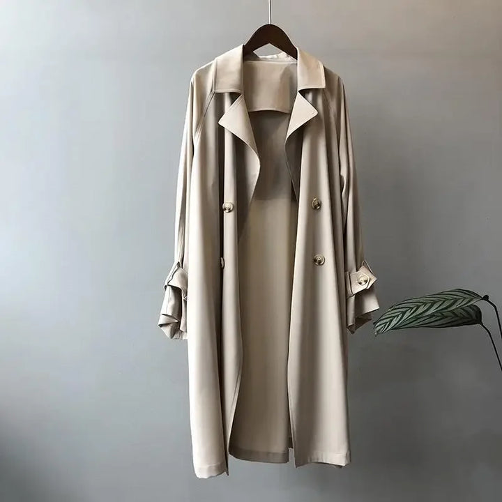 Classic women's double-breasted trench coat, timeless elegant outerwear for spring & fall fashion.