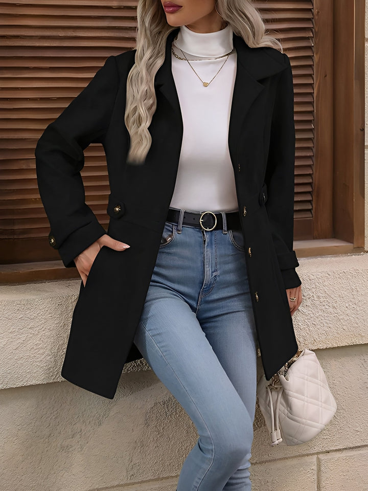 Stylish women's belted trench coat, classic double-breasted design for an elevated workwear.